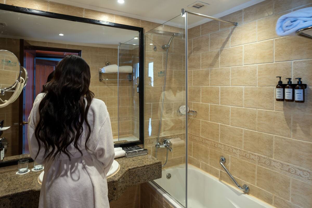 bathtub, free toiletries, hair dryer, bathrobes