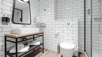 Shower, rainfall showerhead, hair dryer, towels