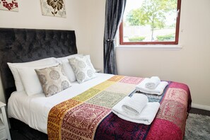 Departamento | 2 habitaciones, tabla de planchar con plancha y wifi gratis 