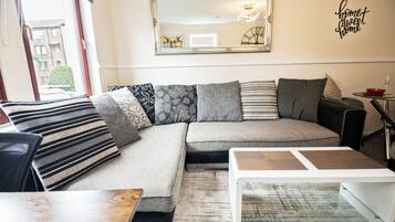 Apartment | Living area | 30-inch TV with digital channels