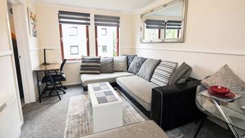 Apartment | Living area | 30-inch TV with digital channels