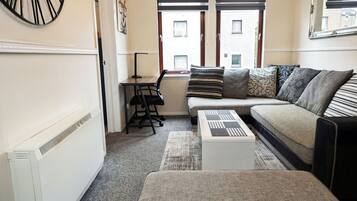 Apartment | Living area | 30-inch TV with digital channels