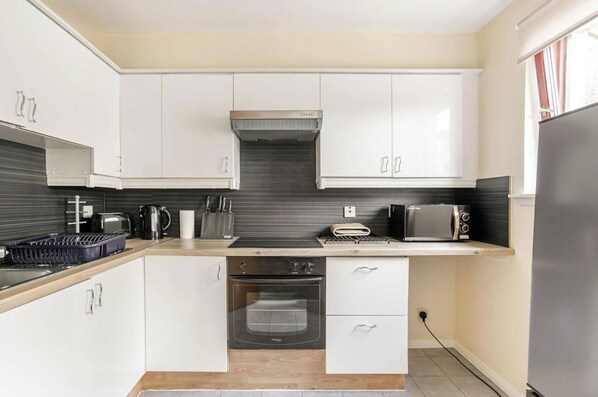 Apartment | Private kitchen | Fridge, microwave, oven, stovetop