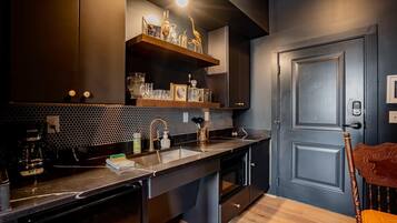 Microwave, stovetop, coffee/tea maker, toaster