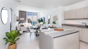 A modern apartment with a kitchen, dining area, and living space. - Hyde Beach House Luxury Condo-resort 2 Bedroom Condo by RedAwning (Hollywood)