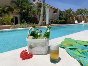 2 outdoor pools, open 9:00 AM to 8:00 PM, pool loungers