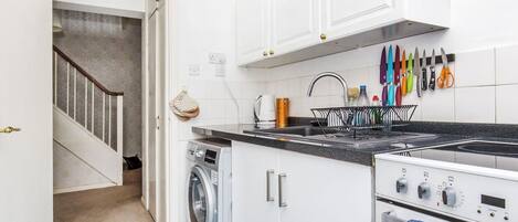 Fridge, microwave, toaster, cookware/dishes/utensils