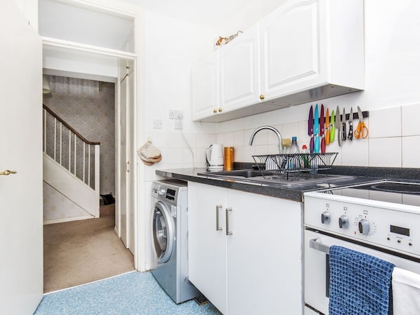 Fridge, microwave, toaster, cookware/dishes/utensils