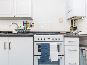 Fridge, microwave, toaster, cookware/dishes/utensils