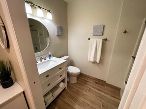 Combined shower/tub, hair dryer, towels, toilet paper - NEW! Modern Condo in Queens Bay with Amazing Views. (Lake Havasu City)