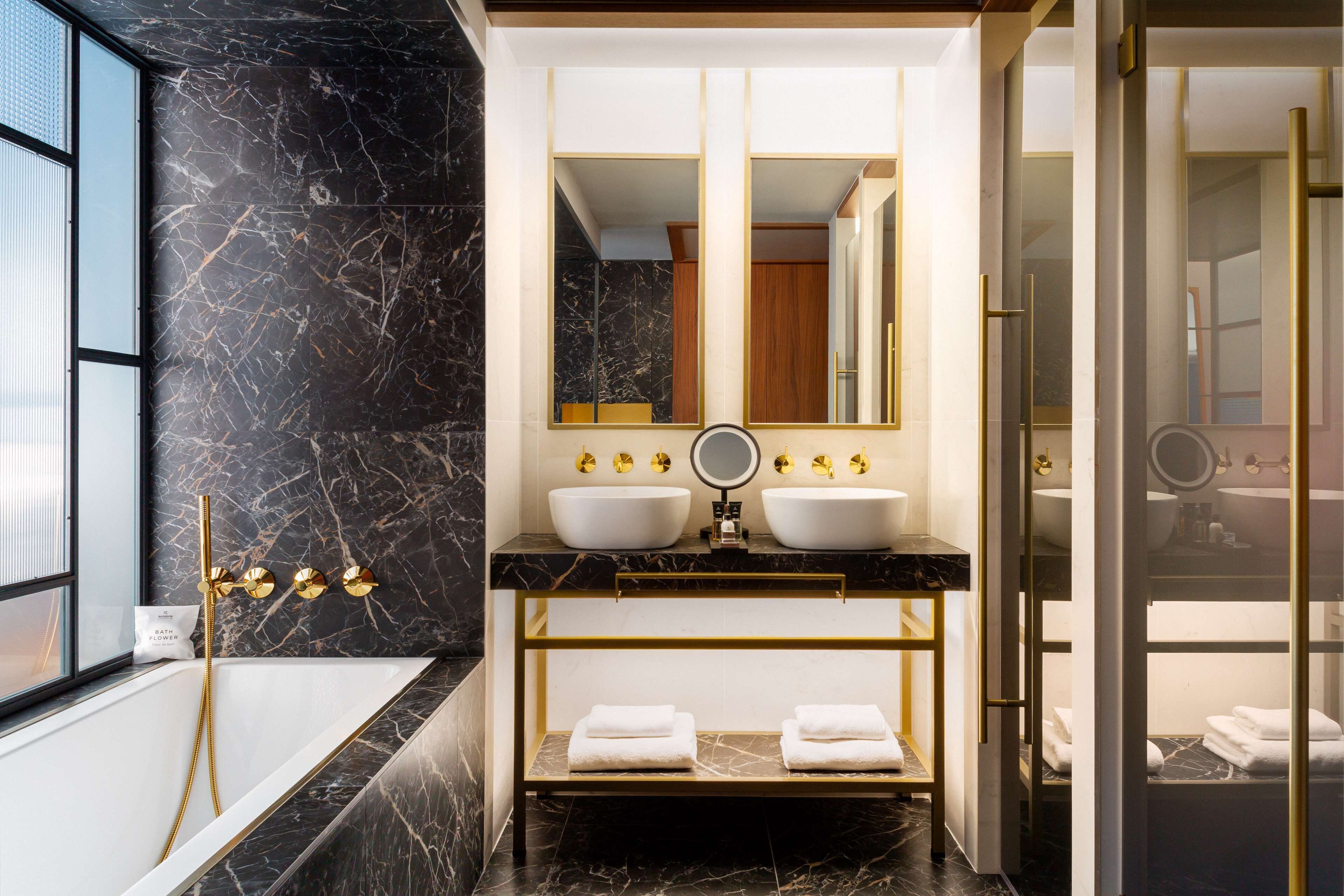 superior room (collection) | bathroom | rainfall showerhead, free toiletries, hair dryer, bathrobes