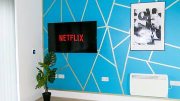 City Apartment | Living area | Flat-screen TV