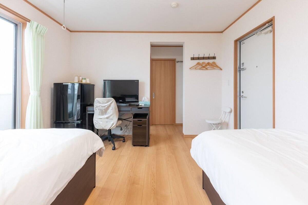 Desk, blackout drapes, WiFi (free), bed sheets