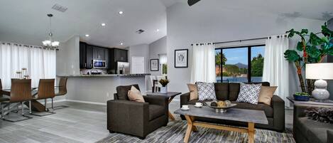 Studio (5 Bedrooms) | Living area | 50-inch TV with cable channels