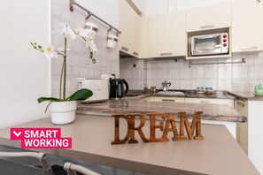 Fridge, oven, electric kettle, toaster