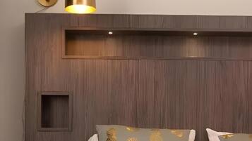 Premium bedding, laptop workspace, blackout curtains, soundproofing