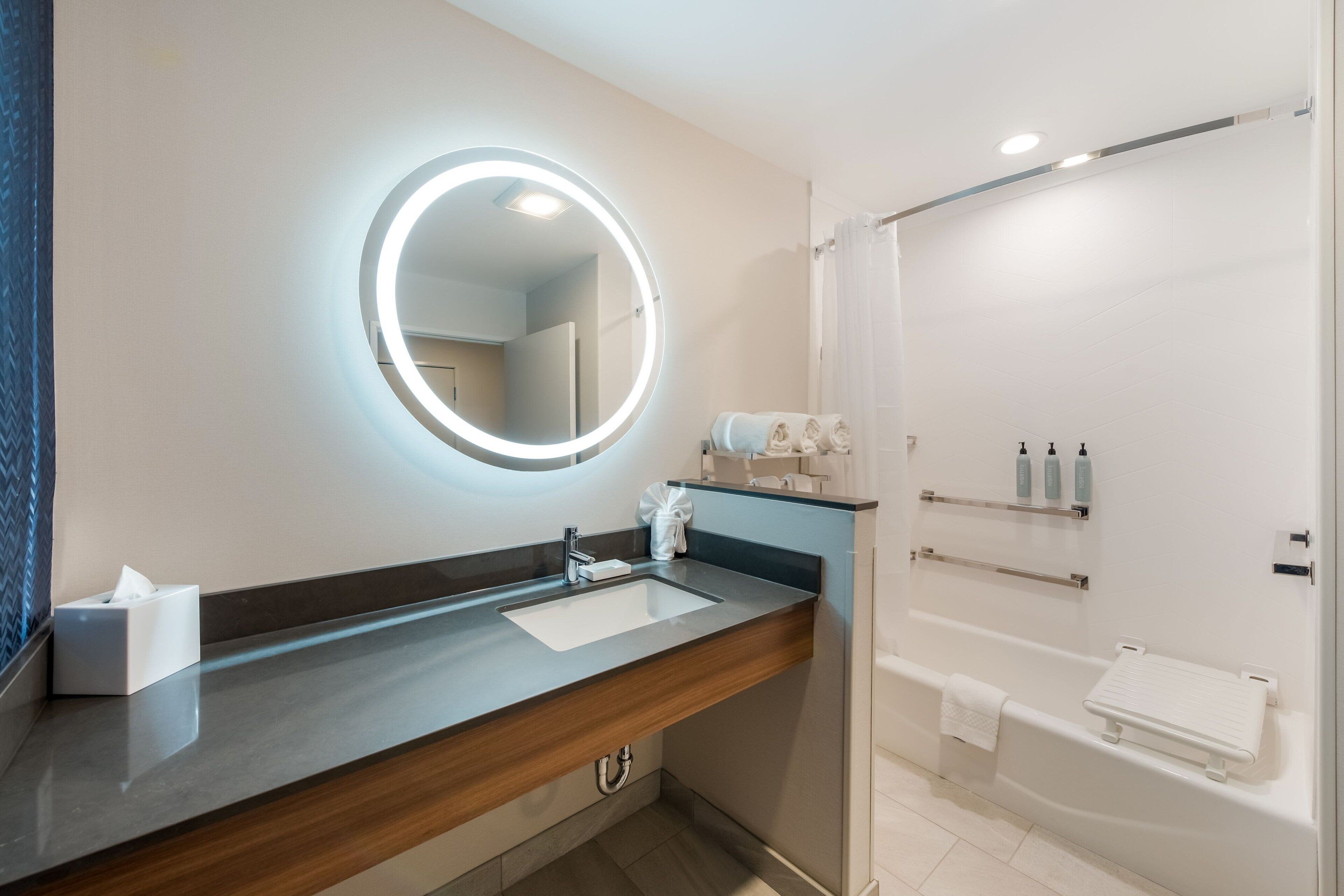 hair dryer, towels, soap, shampoo