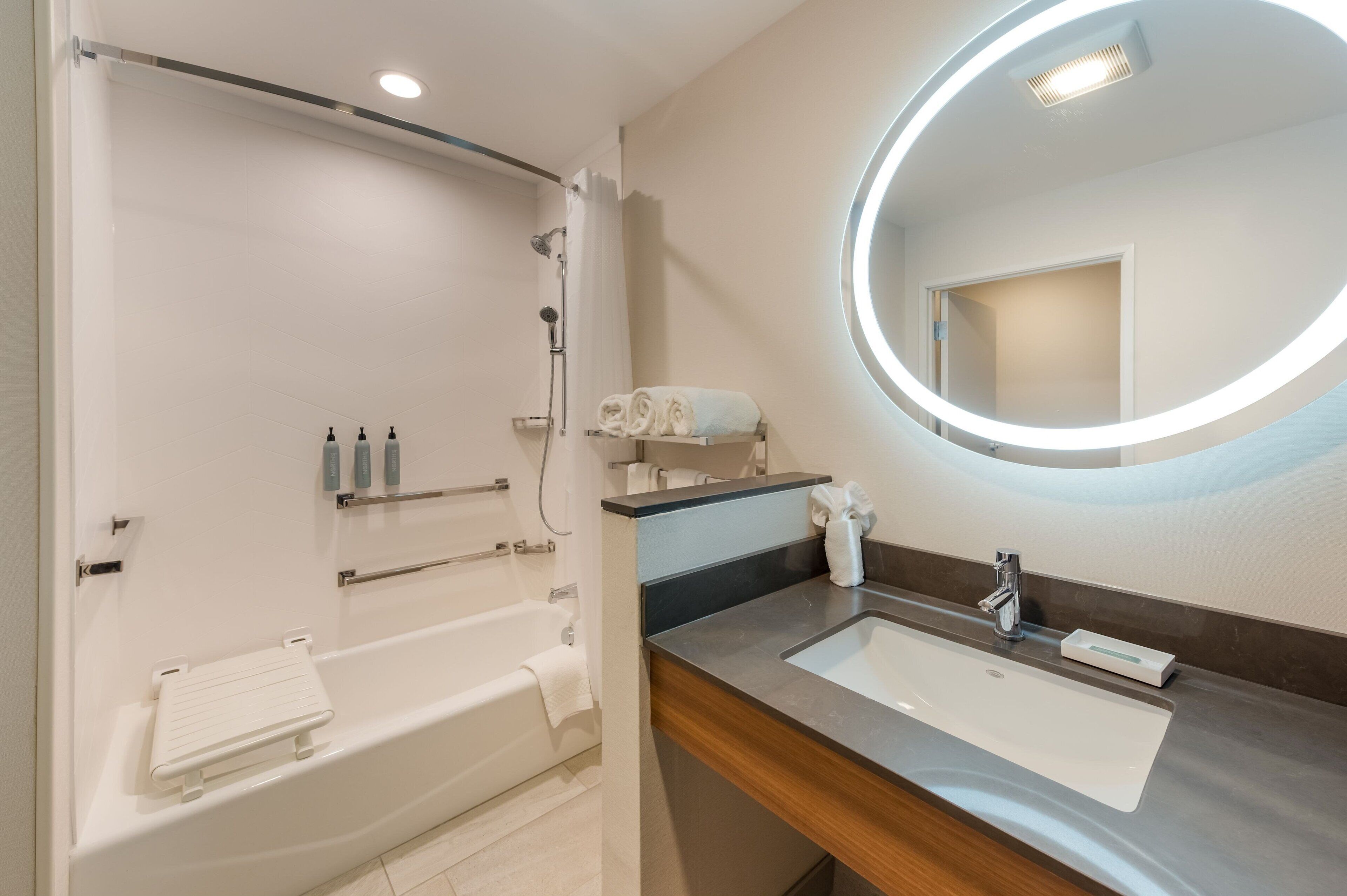 hair dryer, towels, soap, shampoo