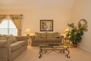 House, Multiple Beds, Private Pool, Golf View | Living room | 42-inch TV with cable channels, MP3 dock - Fc121pp 5 Bedroom Villa in Four Corners (Davenport)