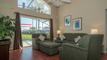 House, Multiple Beds, Private Pool, Golf View | Living room | 42-inch TV with cable channels, MP3 dock