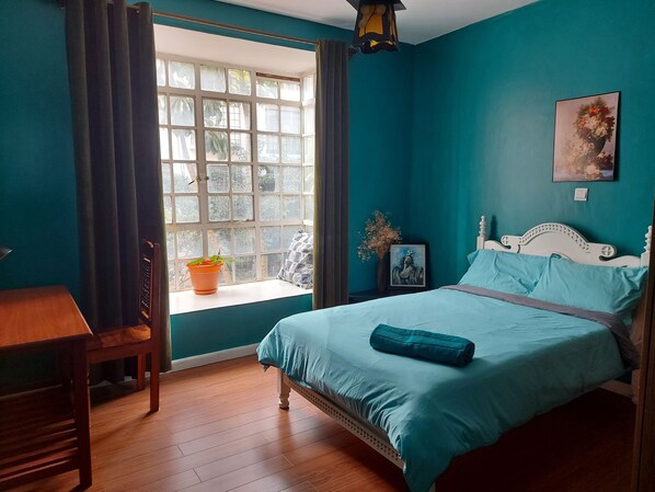 2 dormitorios, tabla de planchar con plancha, wifi gratis y ropa de cama