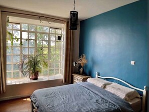 2 dormitorios, tabla de planchar con plancha, wifi gratis y ropa de cama
