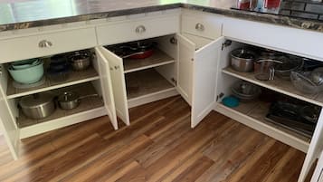 Microwave, dishwasher, coffee/tea maker, cookware/dishes/utensils
