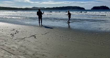 Private villa with lush garden, big pool, and jacuzzi. 5 min walk to the beach