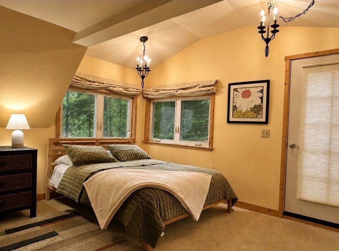 Upstairs loft has a large deck through door seen on right.