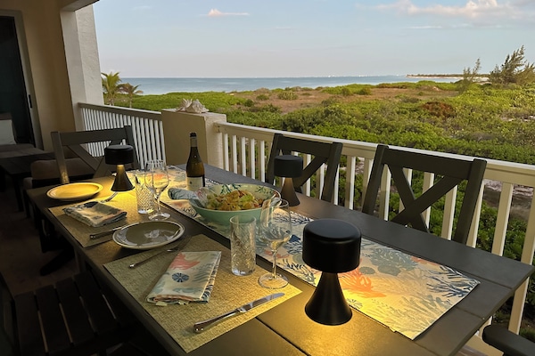 Let our covered balcony elevate your dining experience with an amazing view