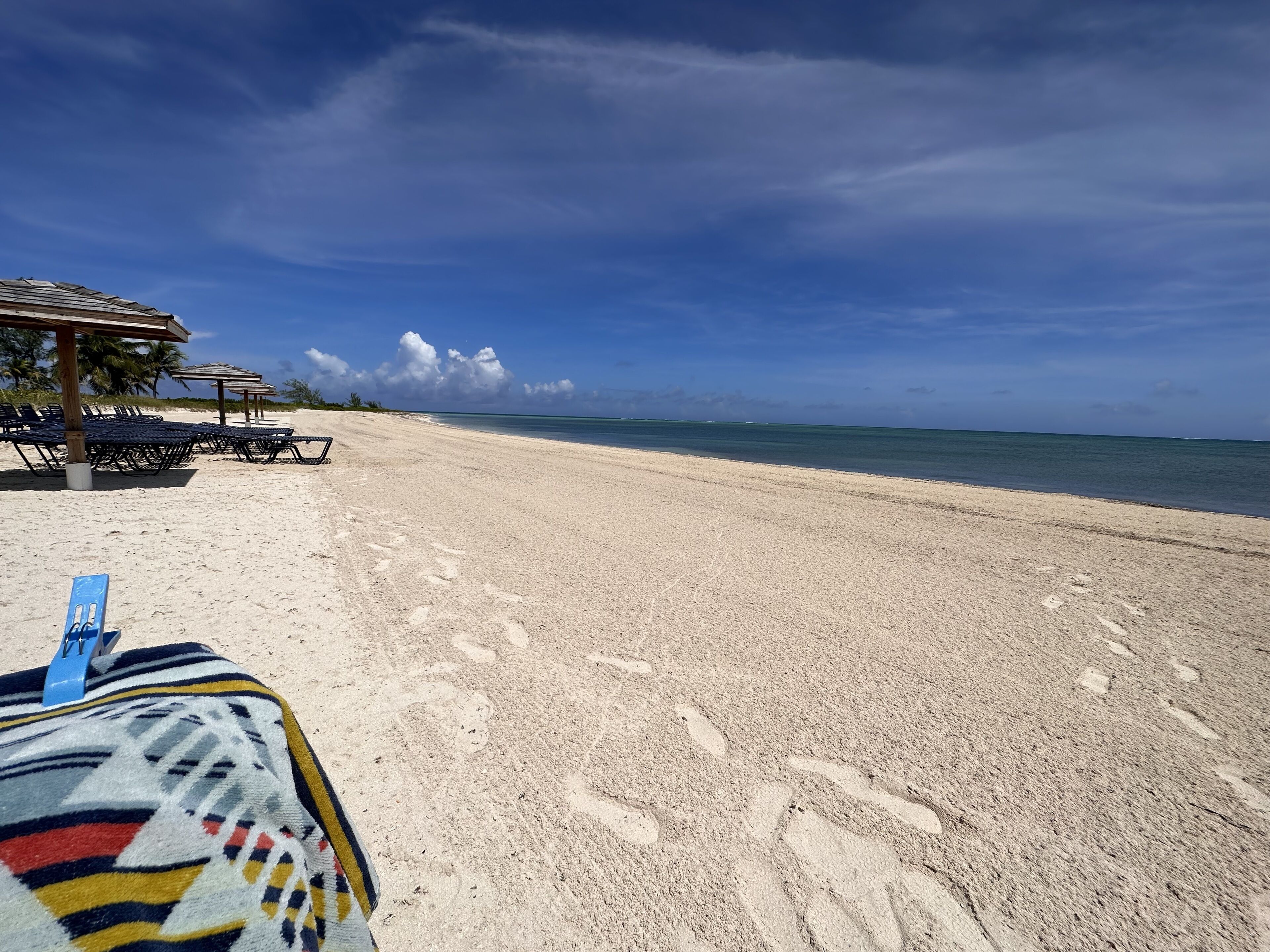 On the beach, sun loungers, beach towels