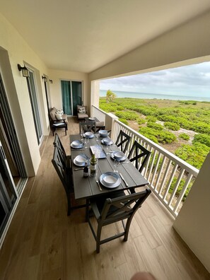 Outdoor dining - Seas the Day TCI covered balcony, patio dining, gated entrance, on site security (Bluehills)