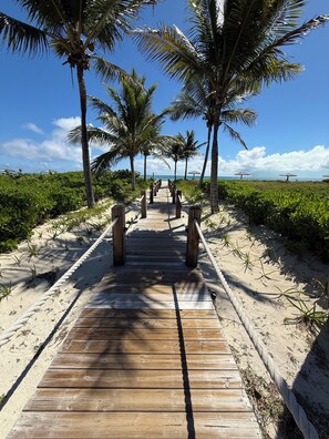 On the beach, sun loungers, beach towels