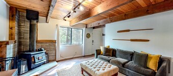 Two-story dog-friendly condo with balcony, washer/dryer, & full kitchen