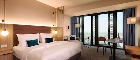 Hypo-allergenic bedding, in-room safe, desk, laptop workspace