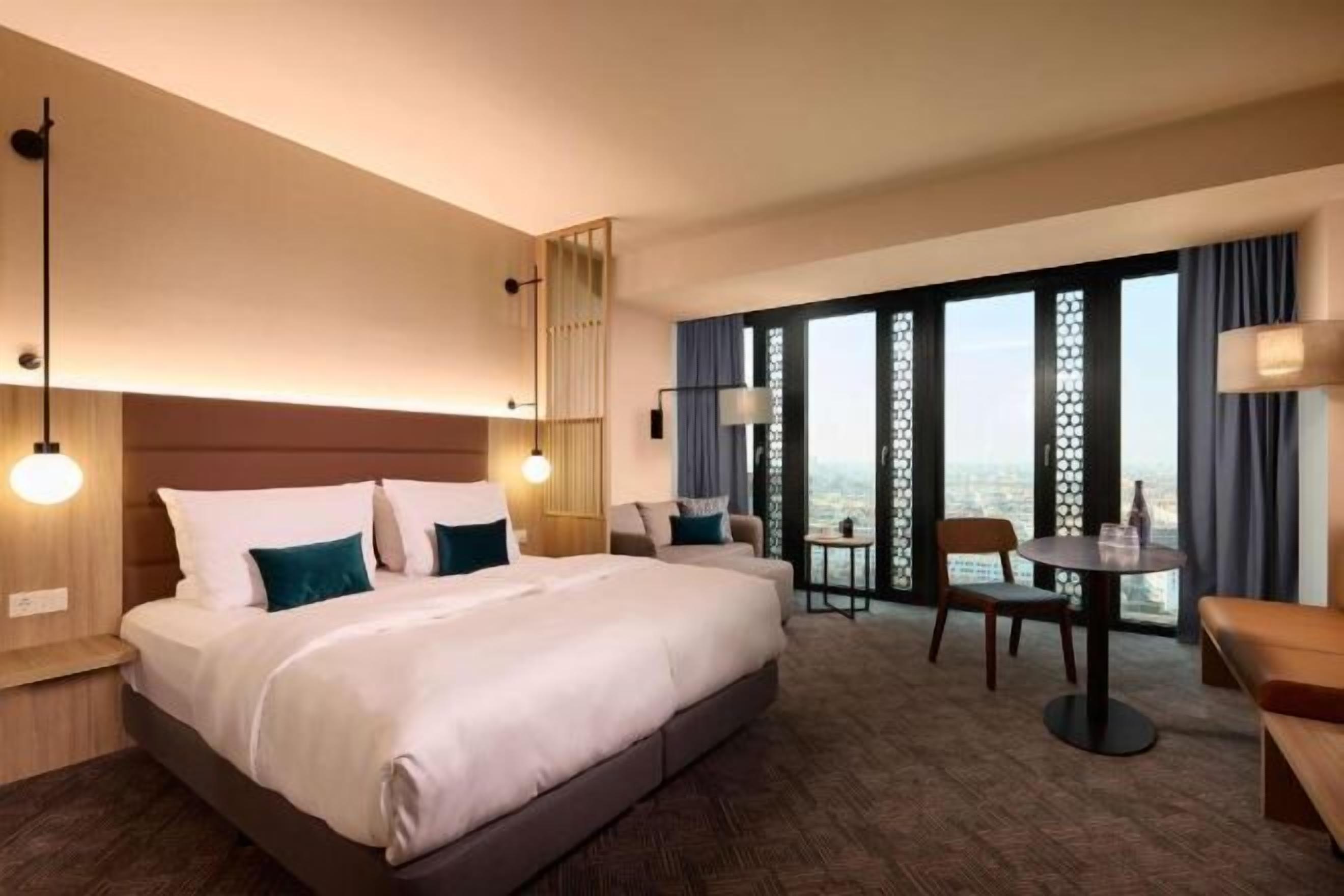 Hypo-allergenic bedding, in-room safe, desk, laptop workspace