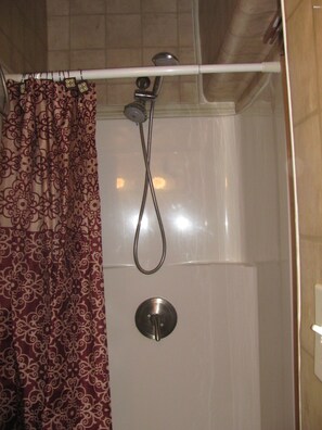 Combined shower/tub, toilet paper