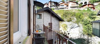 Vakantiehuis 'Il Mulino di Marina - Comomeer' met Rivierzicht, WiFi en Balkons