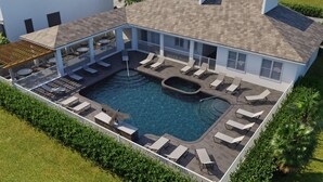 A modern pool area with lounge chairs and a hot tub, surrounded by a white fence and greenery. - Amazing NEW 3 bedroom+loft townhouse in Hidden Forest, with private pool! (Clermont)