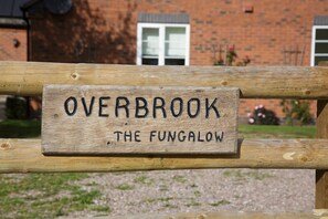 A wooden sign with the text "Overbrook The Fungalow" on a fence. - Overbrook (Droitwich)