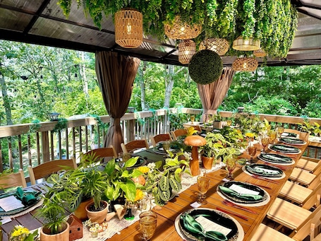 Outdoor dining. Cape Cod Villa pond front vacation home, retreat, spa, venue, film location