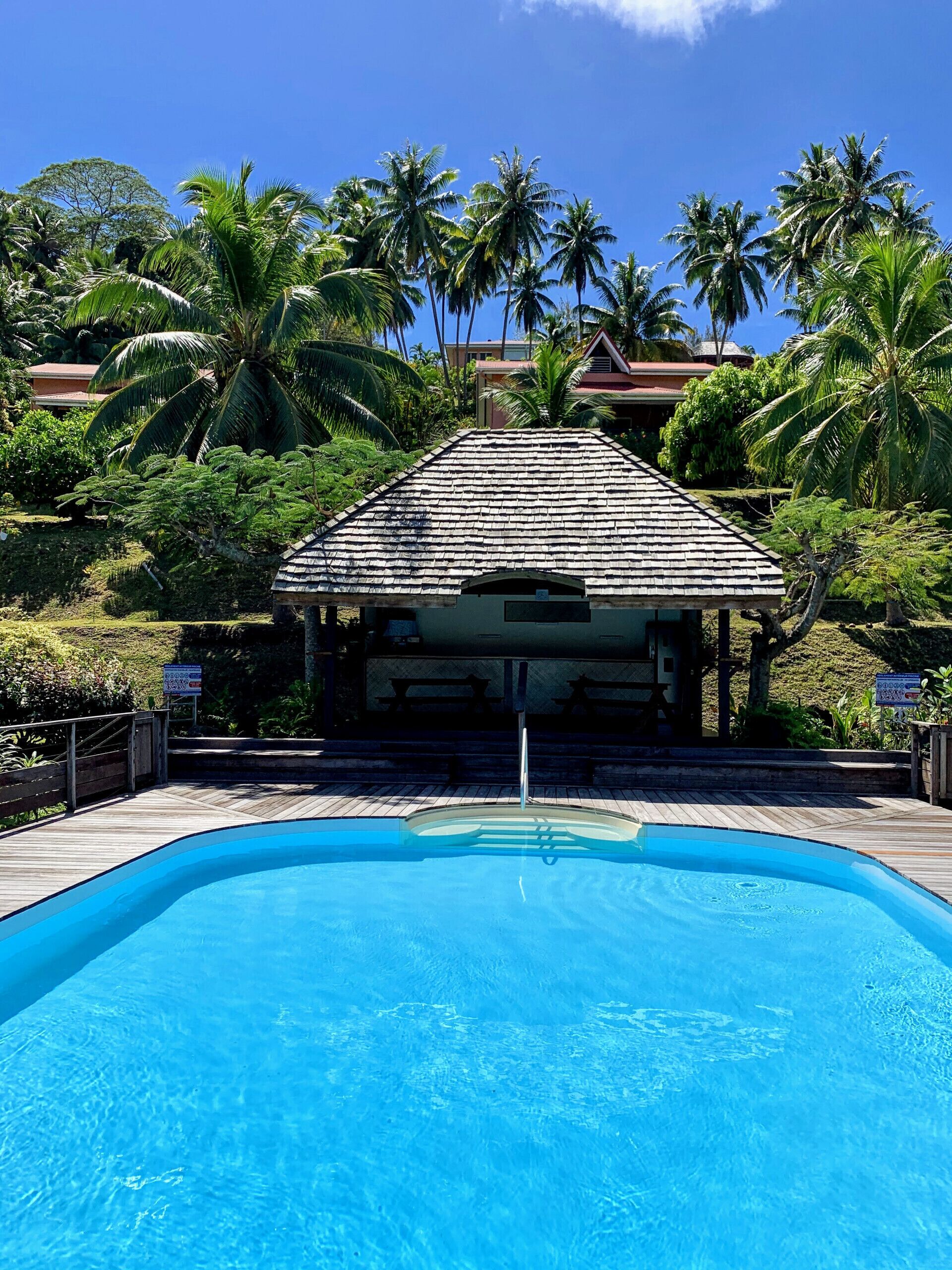 The outdoor swimming pool and its fare pote
