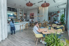 Condo, 1 Bedroom | Bar (on property)
