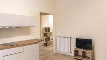 Apartamento panorâmico | Cozinha privada | Geladeira grande, micro-ondas, cooktop