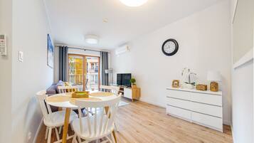 Apartment (C11) | Living area | Flat-screen TV