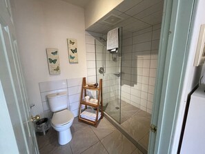 Shower, hair dryer, towels, soap