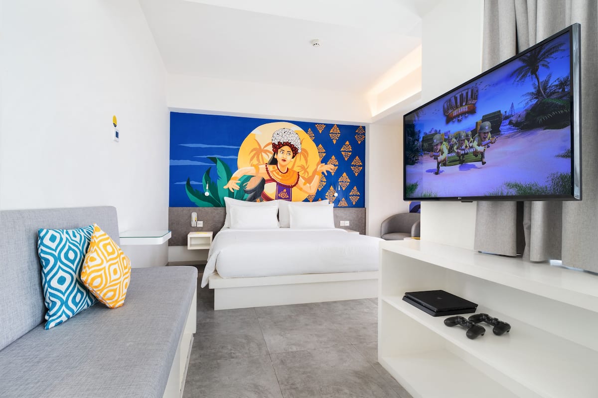 Habitación Deluxe (YELLO) | Minibar, caja de seguridad en la habitación y escritorio