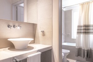 Combined shower/tub, jetted tub