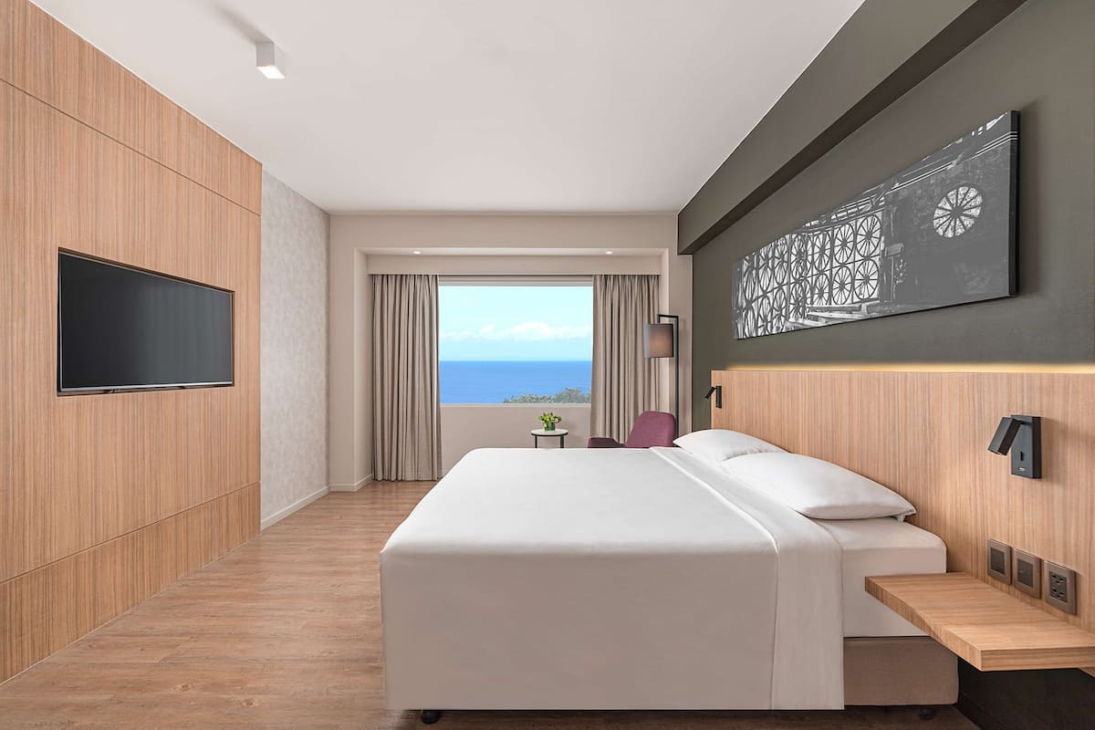 one bedroom suite | in-room safe, desk, laptop workspace, iron/ironing board