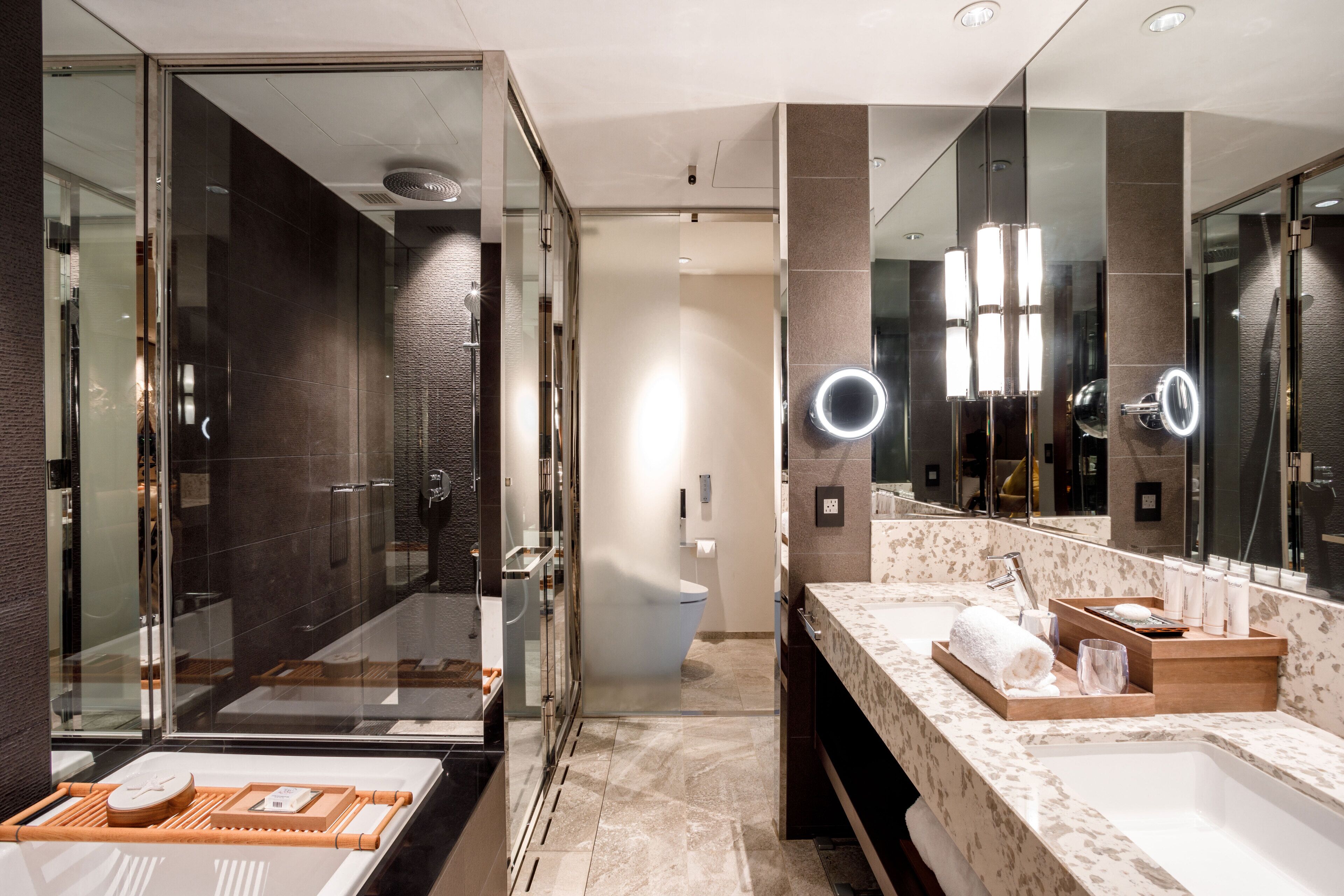 separate bathtub and shower, designer toiletries, hair dryer, bathrobes